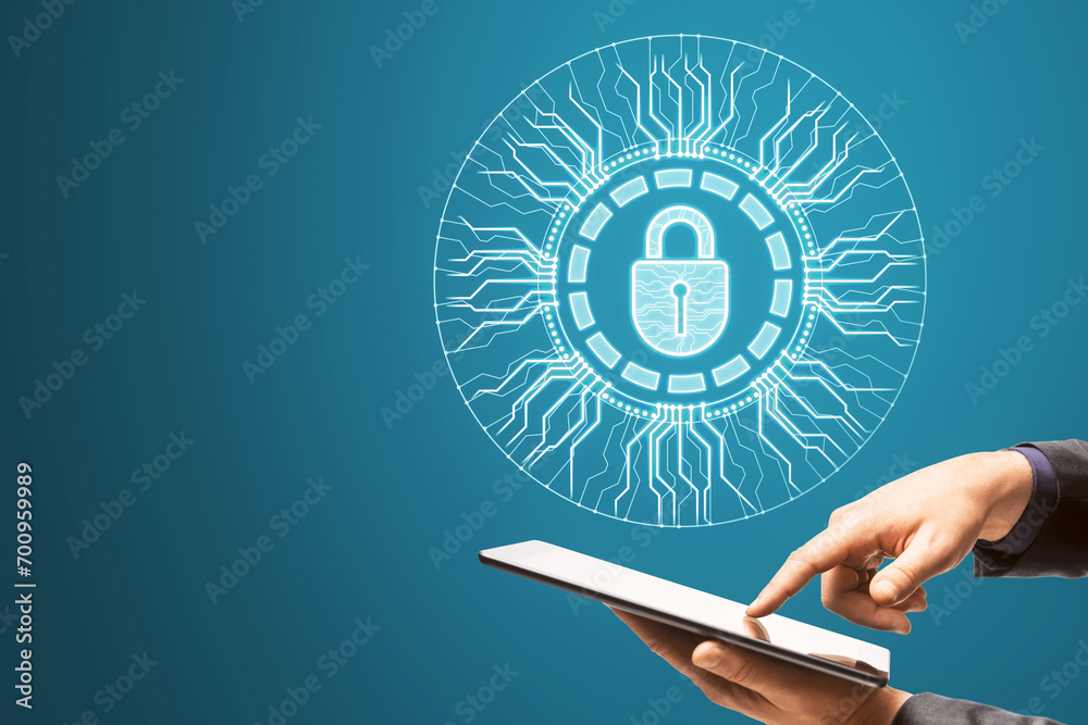 Poster close up of businessman hand holding and using cellphone with creative glowing round padlock hologra