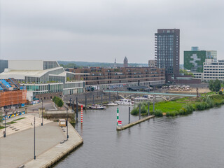 Aerial drone view of the city named Venlo with a small port.