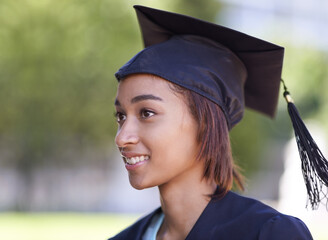 Woman, graduate and college achievement with education, cap and gown for ceremony outdoor. Mockup space, smile and graduation event for academic success, higher learning and certification with pride