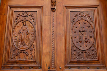 Detail of reliefs on the door of San Buenaventura chapel (18th century), Quito, Ecuador