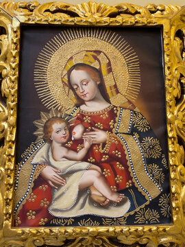 Christian picture exhibited in a room in Riobamba, Ecuador. Virgin Mary breast feeding Jesus
