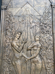 Basilica of the National Vow (Spanish: Bas&rsquo;lica del Voto Nacional), Roman Catholic church located in the historic center of Quito, Ecuador. Door relief depicting Adam and Eve