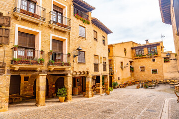 Rafael Ayerbe Square. Old Plaza Mayor of the Pyrenean town of Alquezar, Huesca, Spain