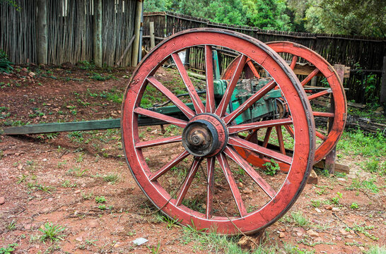 Two wheeled vintage ox cart in Pretoria, South Africa - Old bullock cart with red wheels