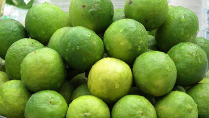 Fresh lemon fruits displayed for sale