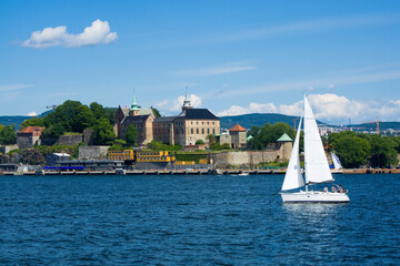 Sailboat in Oslofjord, Akershus Castle and Fortress in the background, Oslo, Norway