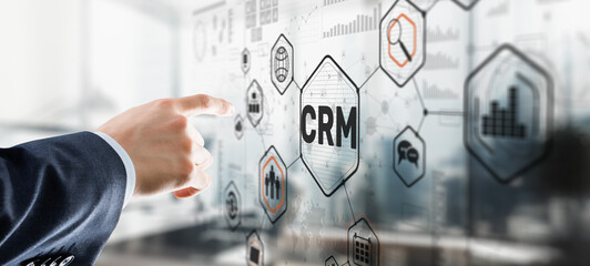Customer relationship management system concept. Businessman touching finger CRM