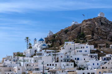 Panoramic view of the beautiful whitewashed village of Ios in Greece, also known as Chora and a...