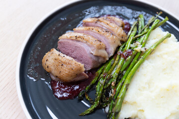 Close-up view of roast duck breast.