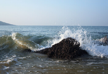 Abstract formation of waves on Devgad beach of Western India.