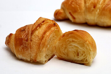 croissant closeup, isolated on white background.