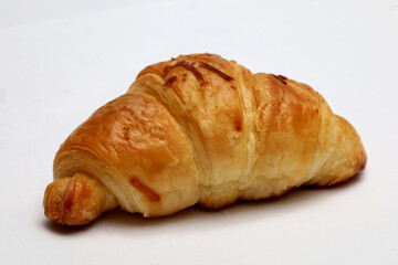 croissant closeup, isolated on white background.