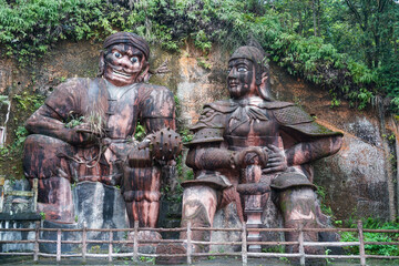 Figure carving decoration of Ba people's totem. Enshi Tushi Castle is a unique Tujia Tushi cultural site. Hubei, China.