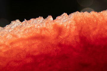 Red and pink watermelon flesh Zoom in with a macro lens or close up to create strange and beautiful...
