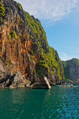 PALAWAN, PHILIPPINES - DECEMBER 21, 2023: Tropical Shimizu Island and paradise beach, El Nido, Palawan, Philippines. Tour A Route. Coral reef and sharp limestone cliffs. 