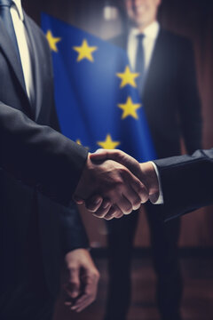 Men shaking hands against flag of European Union, closeup. International relationships