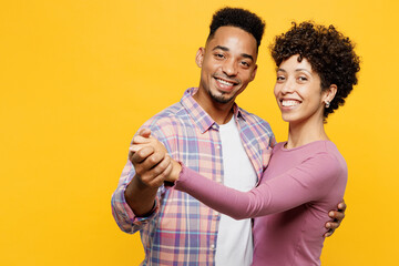 Young romantic happy smiling couple two friends family man woman of African American ethnicity wear...