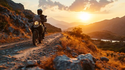 Experienced biker in complete gear riding an off-road motorcycle on a mountain road at sunset. 3D...