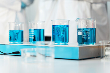 Laboratory Glassware with Blue Chemical Solution