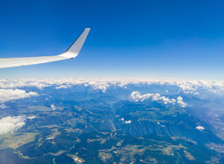 Obraz premium Mountains overlooked from an airplane (Trento, Italy)