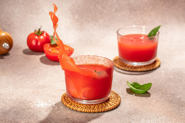 Tomato juice in a glass and fresh tomatoes. organic healthy products. Detox and clean diet concept. place for text, top view