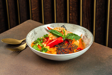 Seafood squid with vegetables pepper and tomatoes, top view