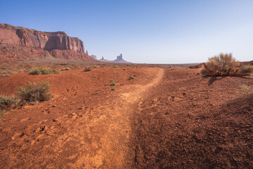 hiking the wildcat trail in monument valley, arizona, usa
