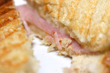 cheese and ham sandwich. sandwich details. bread with ham and cheese. sandwich with selective focus.
