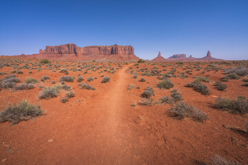 hiking the wildcat trail in monument valley, arizona, usa