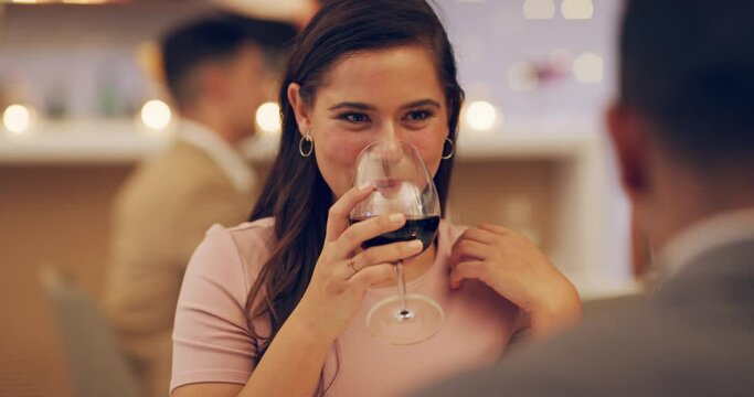Happy couple on date in restaurant with wine, cheers and romantic evening together with fine dining. Celebration of love, man and woman relax in luxury diner with toast, valentines day and glasses