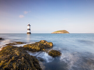 Penmon Lighthouse and Puffin Island, Anglesey, North Wales.