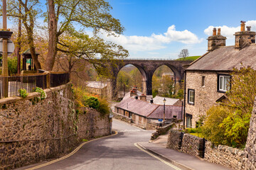 The village of Ingleton, with its cottages and railway viaduct, Yorkshire Dales National Park, North Yorkshire, England, UK - obrazy, fototapety, plakaty