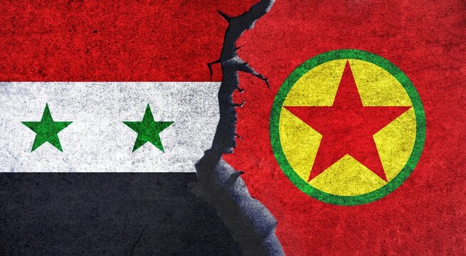 Syria and PKK flags on a wall with a crack. PKK and Syria conflict, war crisis, economy, relationship, trade concept