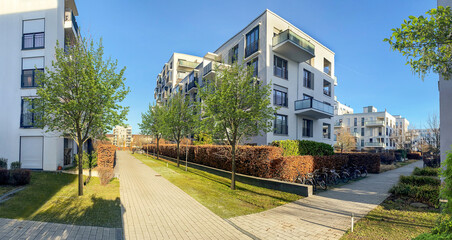 Cityscape of a residential area with modern apartment buildings, new sustainable urban landscape in...