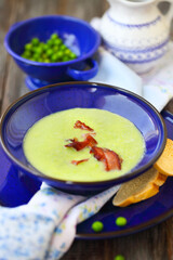 Bowl of vegetable soup with ham