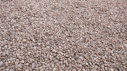 Smooth pebbles on a dry river bed