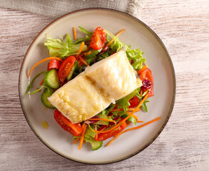 Cod fillet with salad