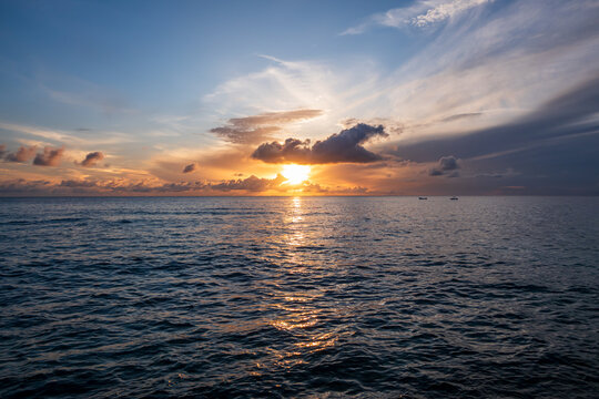 Paynes Bay Beach, Barbados: amazing colorful sunset in the caribbean sea.
