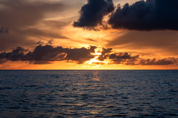 Paynes Bay Beach, Barbados: an amazing colorful sunset in the caribbean sea.