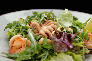 Seafood salad, octopus, shrimp, scallop, squid and mixed greens