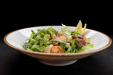 Seafood salad, octopus, shrimp, scallop, squid and mixed greens