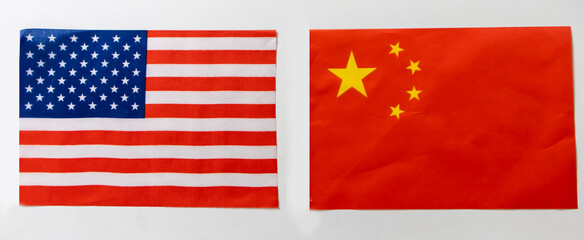 USA and China flags on white background.,Trade, investment, exports and imports of the United States and China.