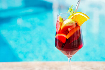 Refreshing classic fruit sangria by the pool