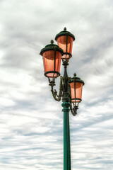 Fototapeta na wymiar Street light in Venice, Italy