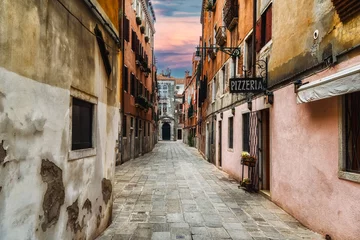 Fotobehang Quaint street in historic Venice, Italy with Pizzeria sign © atosan