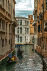 Traditional Venice gondola on famous canal. Beautiful Venice view.