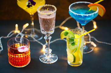 Different cold refreshing cocktails on the table