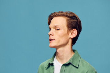 Confident Young Man in Stylish Studio Portrait with Serious Expression