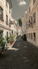 Fototapeta na wymiar Old street in historic Vienna Spittelberg district, Wien, Austria