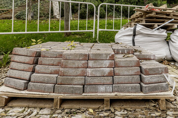 A pallet of paving stones to pave open streets